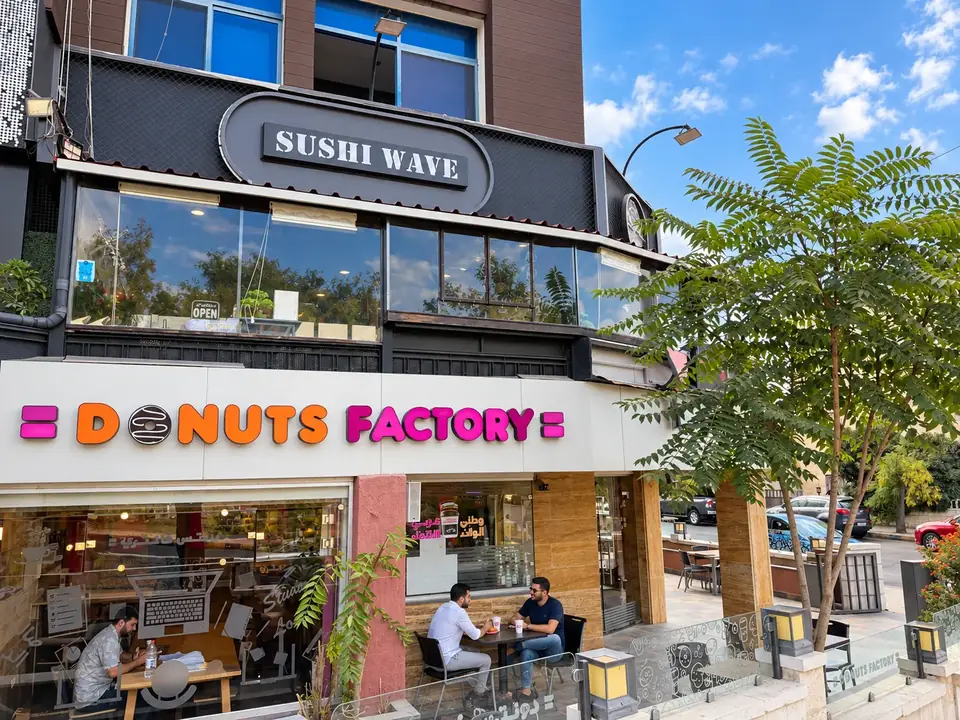 Al Hussein (Across Frères) storefront