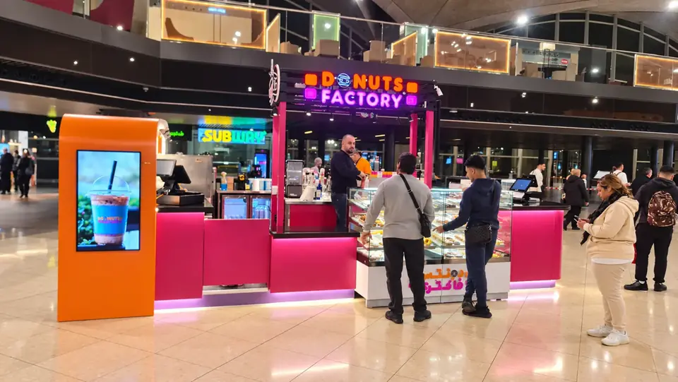 QAI Airport Duty Free service counter